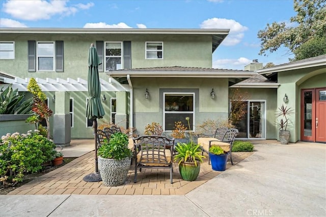 back of house featuring a patio