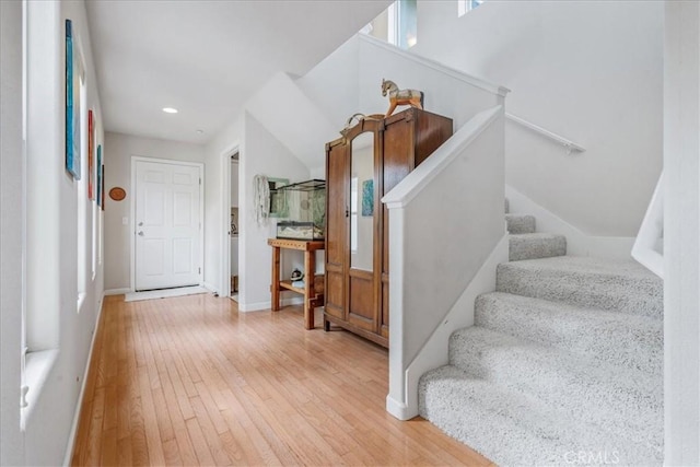 entrance foyer with light hardwood / wood-style flooring