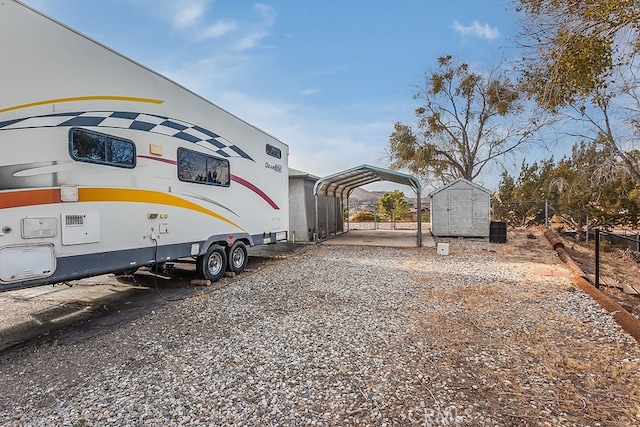 exterior space with a carport