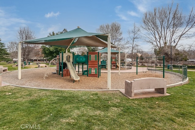 view of play area featuring a lawn