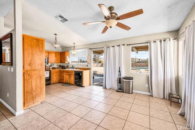 kitchen with light tile patterned flooring, decorative light fixtures, a textured ceiling, range with electric stovetop, and ceiling fan