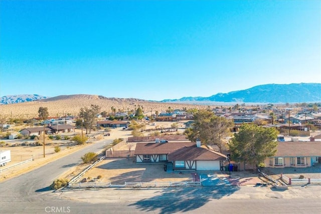 drone / aerial view featuring a mountain view