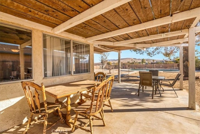 view of patio / terrace with a mountain view