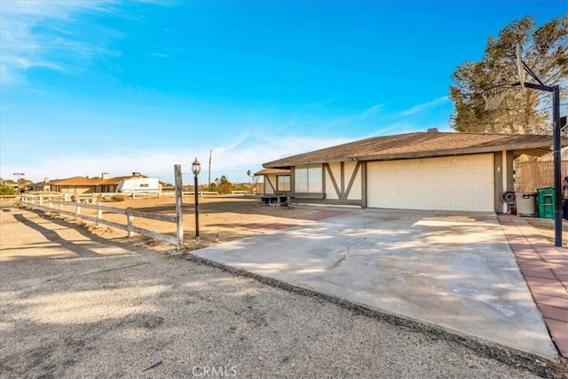 view of front of property with a garage