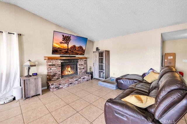 tiled living room with vaulted ceiling, a brick fireplace, and a textured ceiling