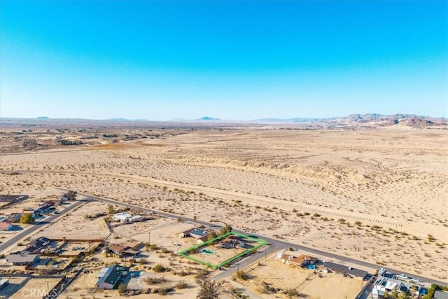 bird's eye view with a mountain view