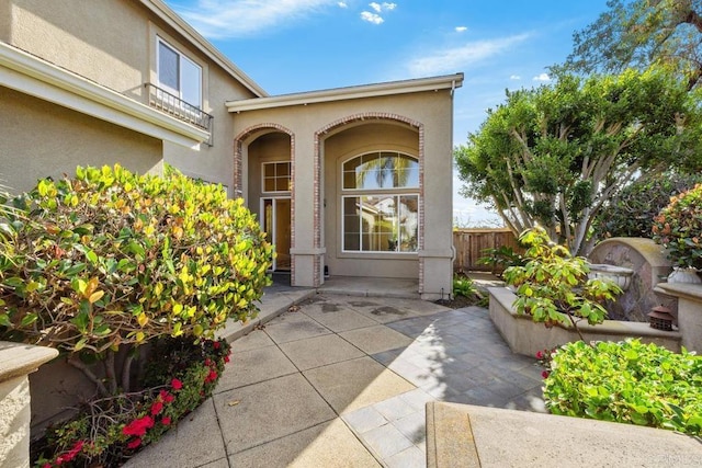 doorway to property featuring a patio