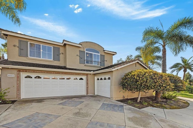 view of front of property with a garage