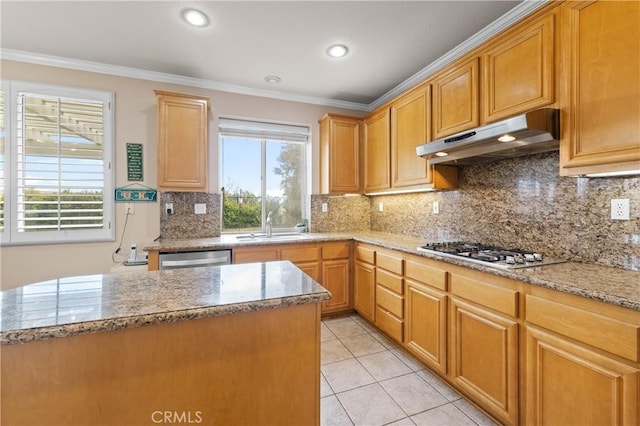 kitchen with sink, light tile patterned floors, stainless steel appliances, ornamental molding, and light stone countertops