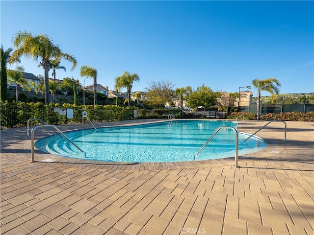 view of pool with a patio