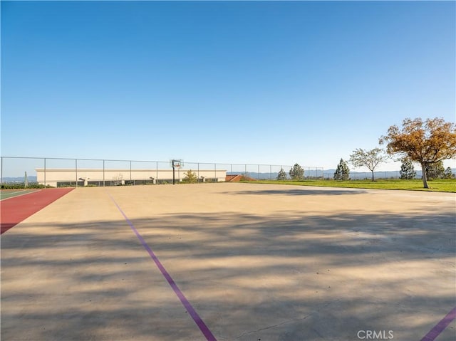 view of property's community featuring fence