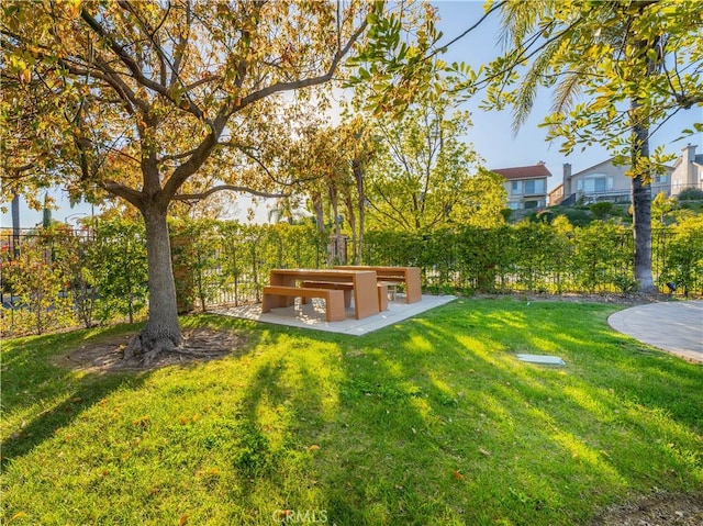 view of yard featuring a patio area and fence