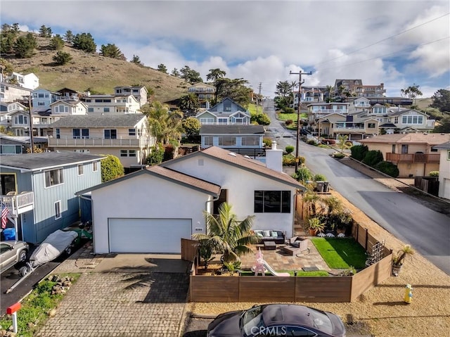 birds eye view of property with a residential view