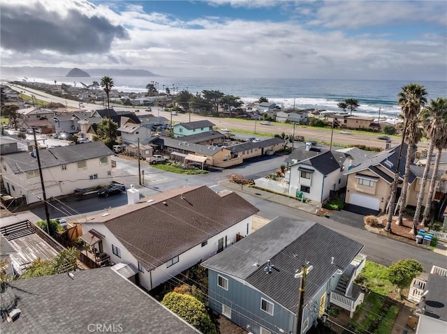 bird's eye view featuring a water view and a residential view