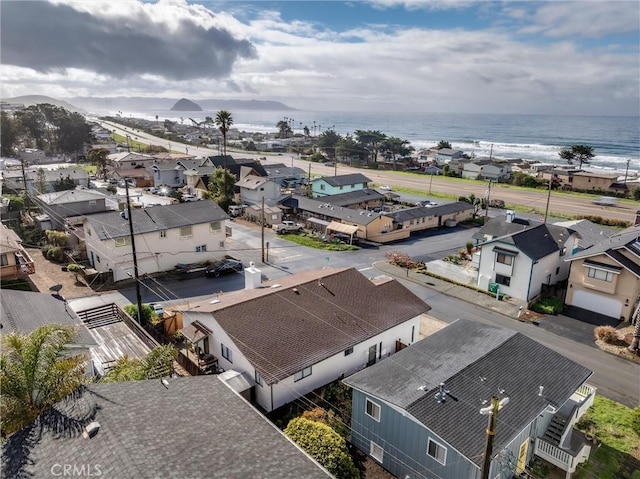 birds eye view of property with a water view and a residential view