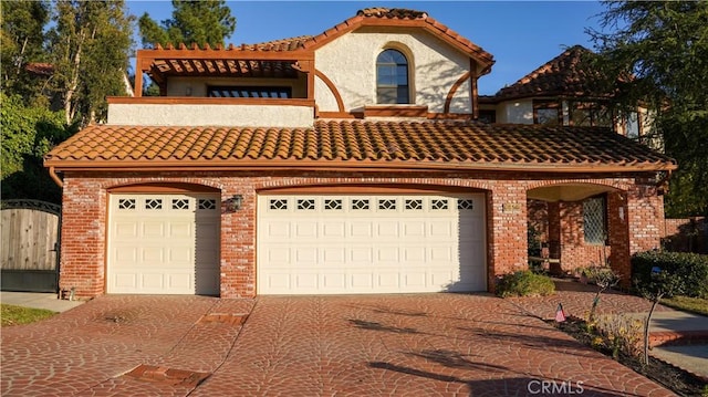 view of front of home with a garage