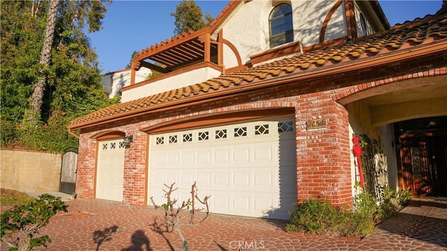 view of side of property featuring a garage