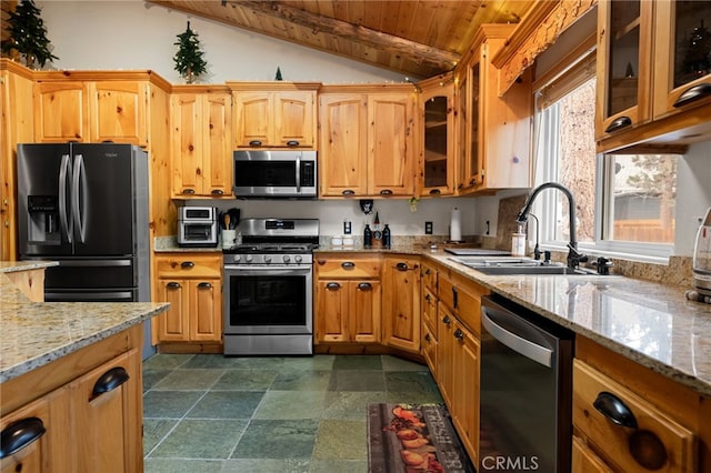 kitchen featuring lofted ceiling, sink, wooden ceiling, appliances with stainless steel finishes, and light stone countertops