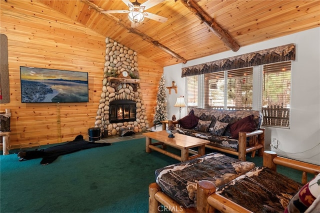 living room with ceiling fan, vaulted ceiling with beams, carpet floors, a fireplace, and wooden ceiling