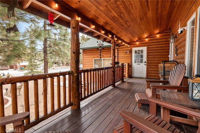 view of snow covered deck