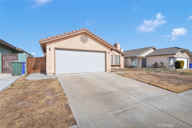 ranch-style home with a garage