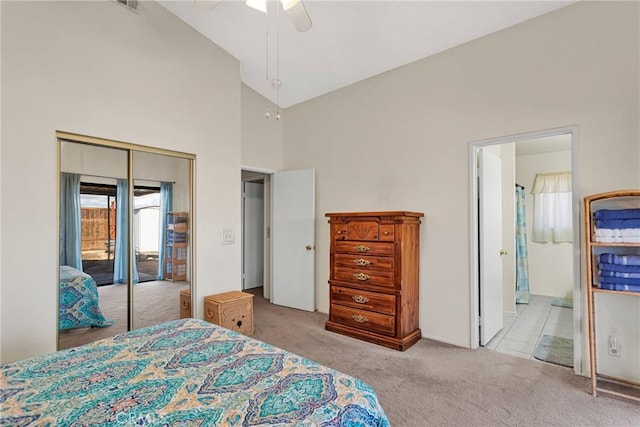 carpeted bedroom with high vaulted ceiling, connected bathroom, access to exterior, and ceiling fan