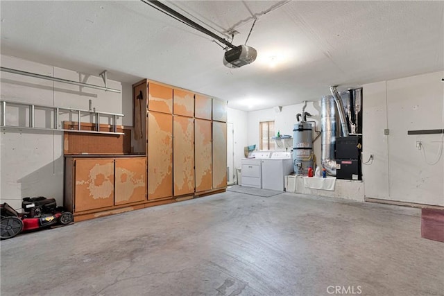 garage featuring a garage door opener, separate washer and dryer, heating unit, and water heater