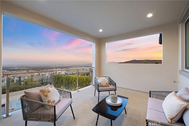 interior space with a balcony and an outdoor living space