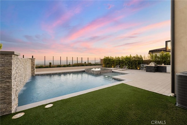 20436 W Liverpool Way, Porter Ranch, CA 91326 - view of swimming pool featuring central AC, a pool with connected hot tub, and a patio