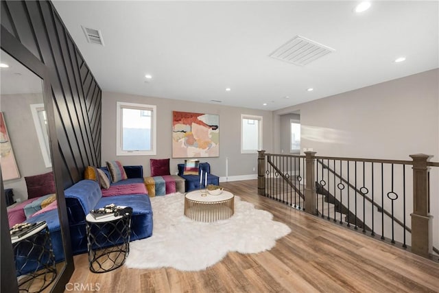 20436 W Liverpool Way, Porter Ranch, CA 91326 - living area featuring an upstairs landing, wood finished floors, recessed lighting, and baseboards