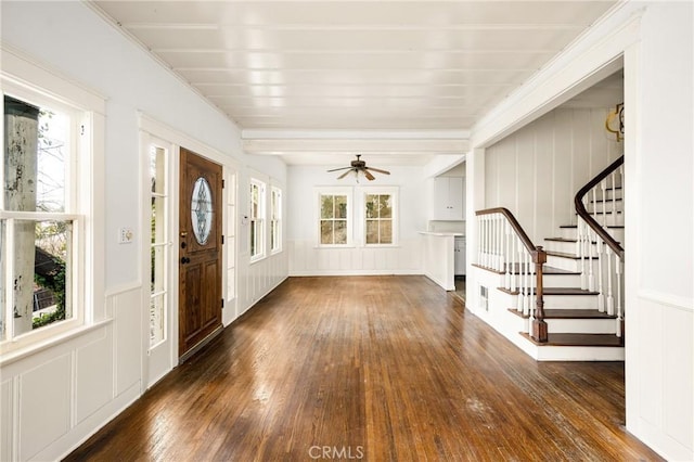 entryway featuring ceiling fan and dark hardwood / wood-style floors