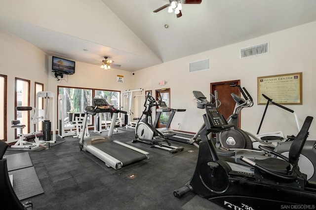 gym with ceiling fan and high vaulted ceiling