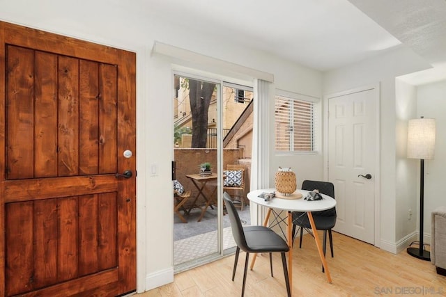 dining room with light hardwood / wood-style flooring