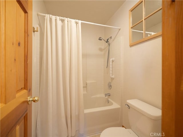 bathroom featuring toilet and shower / bathtub combination with curtain