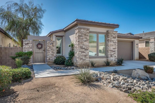 view of front of home with a garage