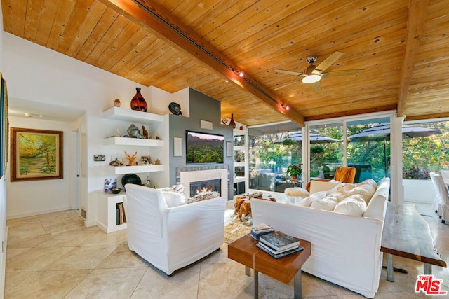 living room featuring wood ceiling, ceiling fan, a fireplace, lofted ceiling with beams, and light tile patterned flooring