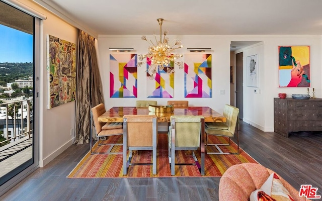 dining area featuring an inviting chandelier and dark hardwood / wood-style flooring