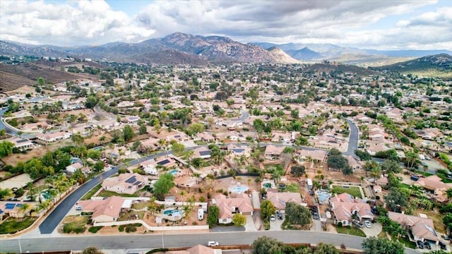 drone / aerial view featuring a mountain view