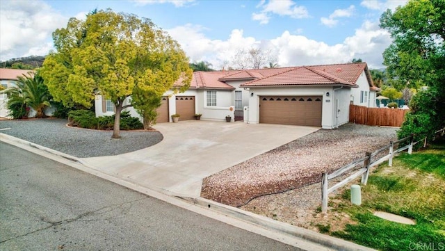 view of front of property with a garage