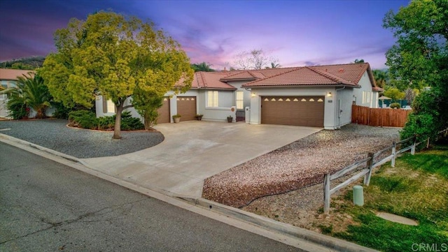 view of front of home featuring a garage