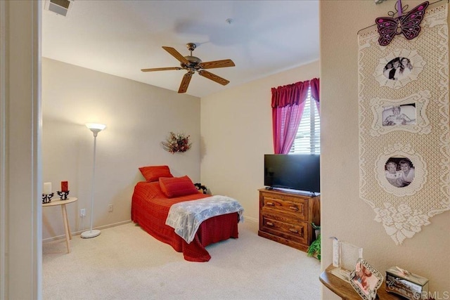 bedroom with ceiling fan and light colored carpet