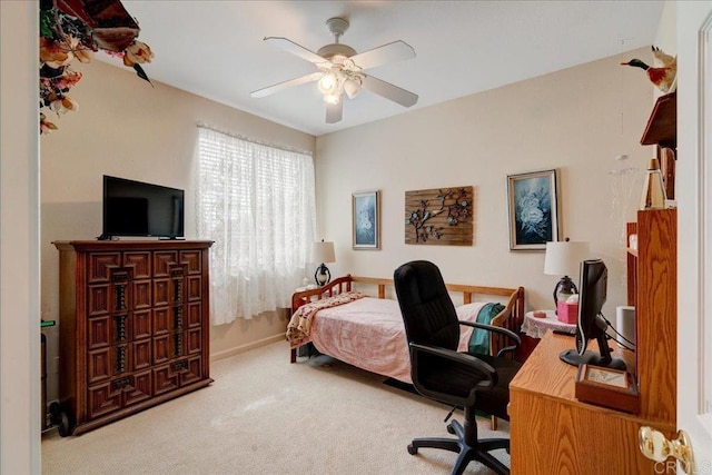 bedroom with ceiling fan and carpet floors