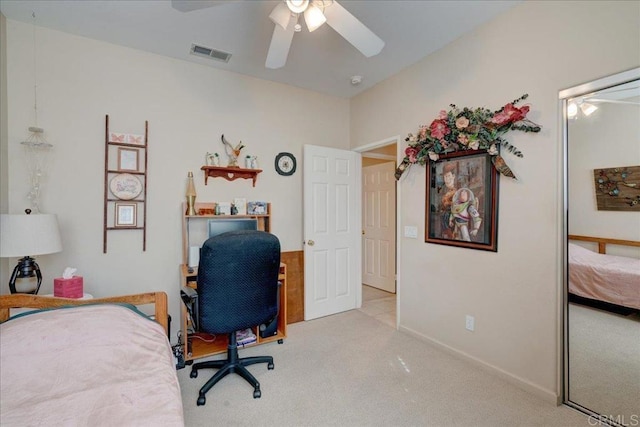 bedroom with ceiling fan and light colored carpet