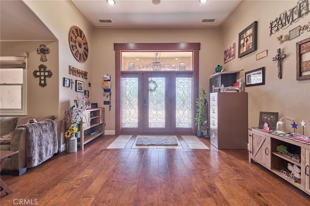 foyer featuring french doors and hardwood / wood-style floors