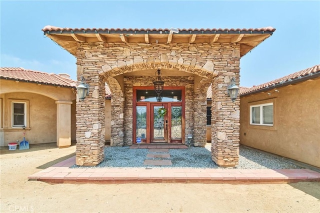 view of exterior entry with french doors