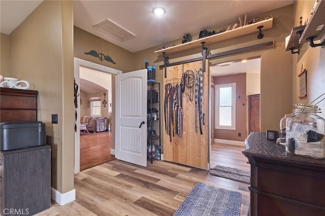 entrance foyer with light hardwood / wood-style floors