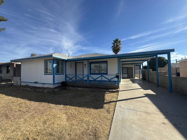 view of front of home with a carport