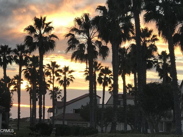 view of outdoor building at dusk