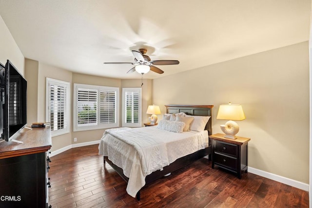 bedroom featuring ceiling fan and dark hardwood / wood-style floors