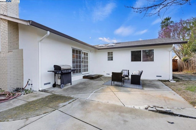 rear view of property with a patio